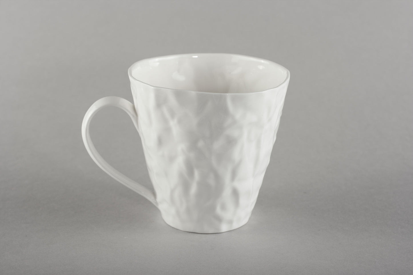 Porcelāna burzīta tējas krūze Co