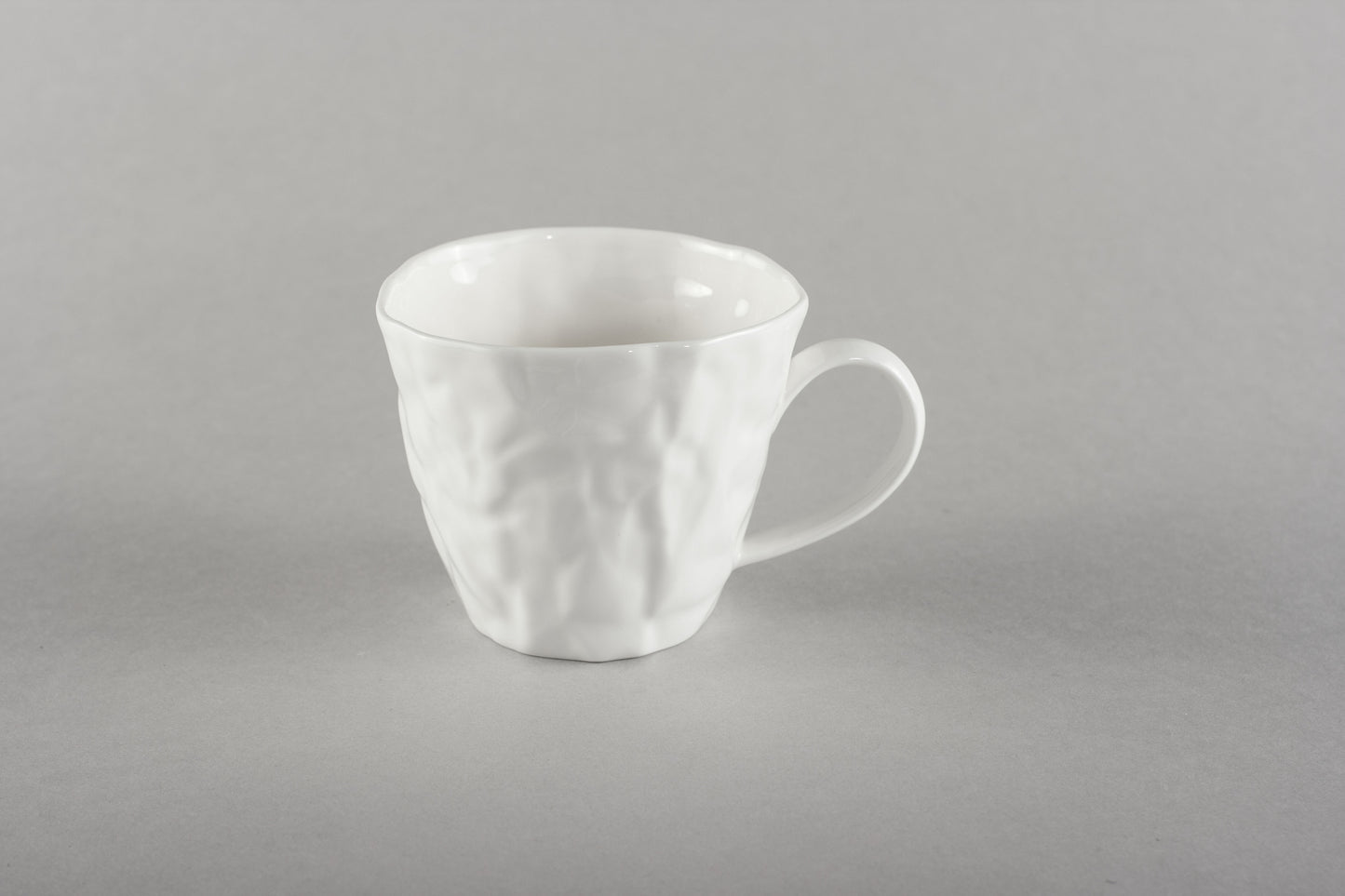 Porcelāna burzīta kafijas krūze Co
