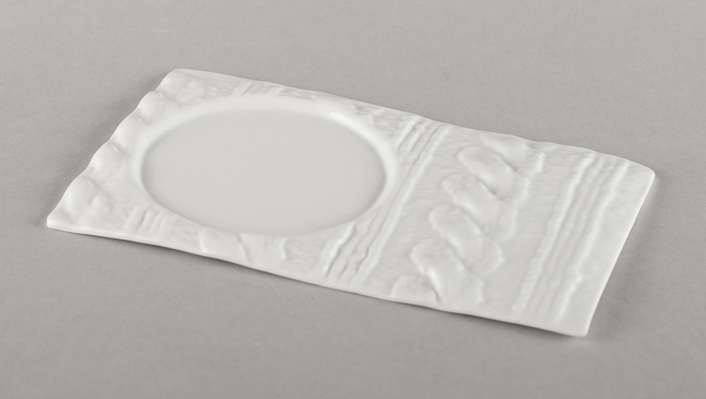 Porcelāna adīta apakštase tējas krūzei (krūze nav iekļauta)