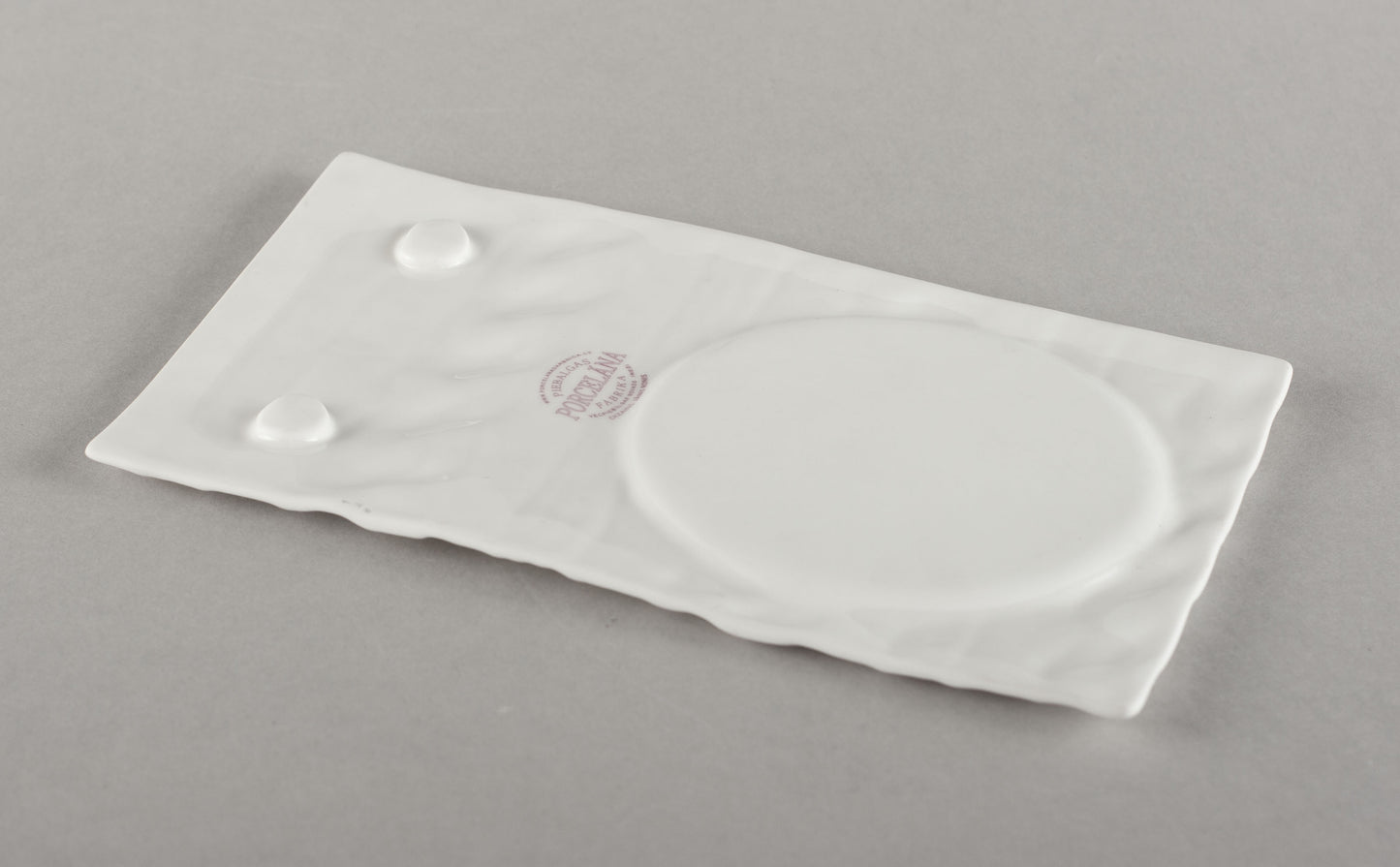 Porcelāna adīta apakštase tējas krūzei (krūze nav iekļauta)