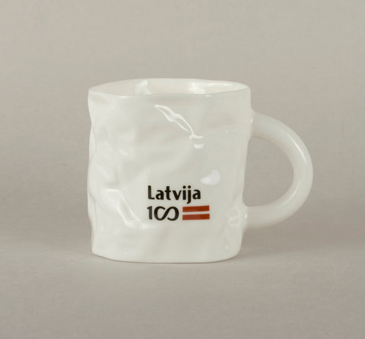 LV100. Burzīta kafijas krūze 1