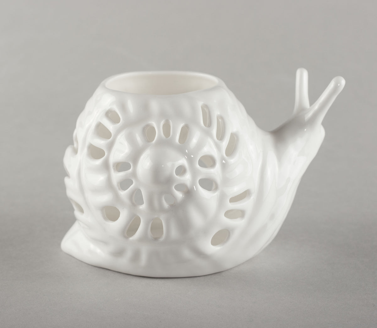 Porcelāna svečturis Gliemezis